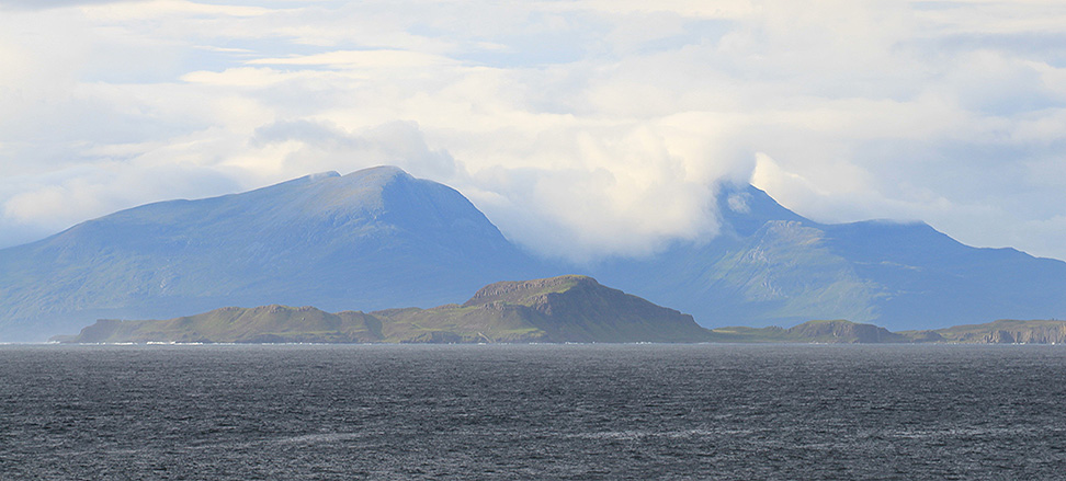 Isle of Muck foreground, Isle of Rum background taken from Ardnamurchan point