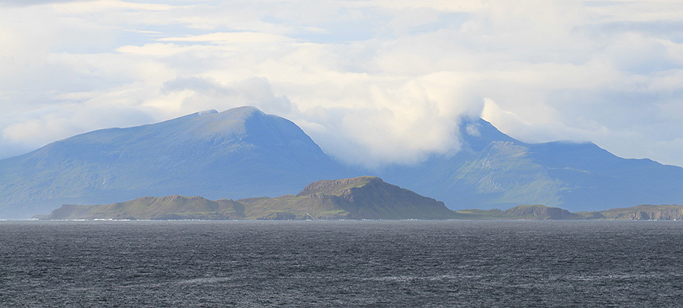 Isle of Muck foreground, Isle of Rum background taken from Ardnamurchan point